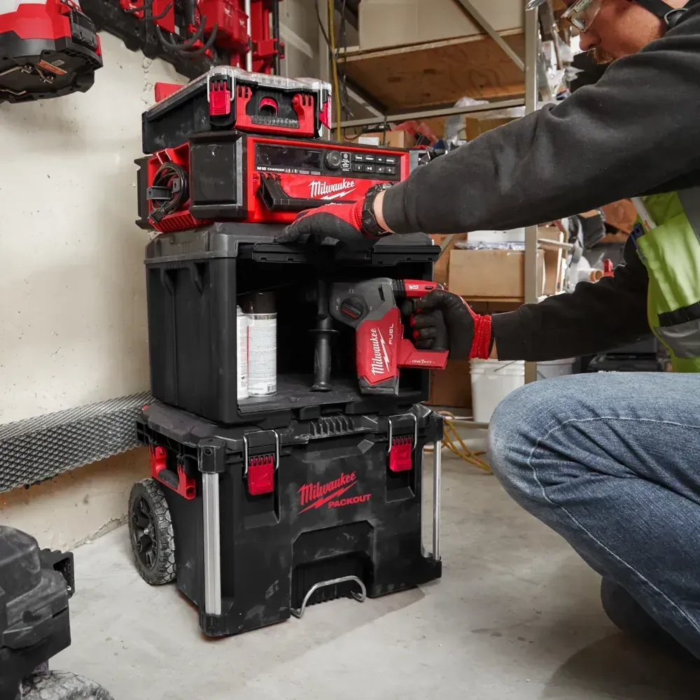 Milwaukee PACKOUT modular cabinet with secure lock mechanisms and 22 kg weight capacity