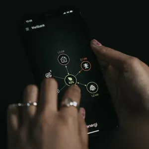 The myenergi app interface on a smartphone screen showing a zappi GLO charging session using surplus energy from solar panels.